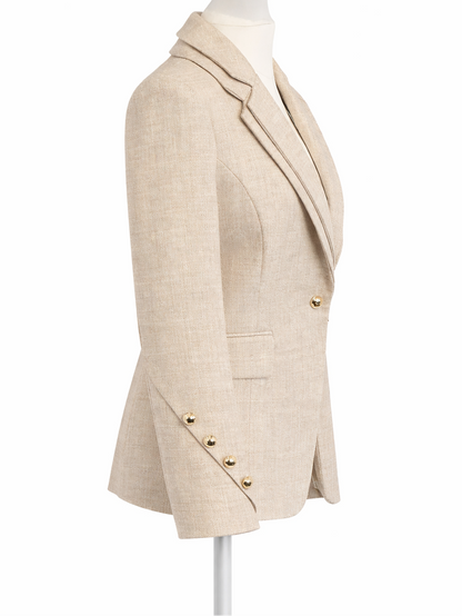 Beige blazer on a mannequin against a white background